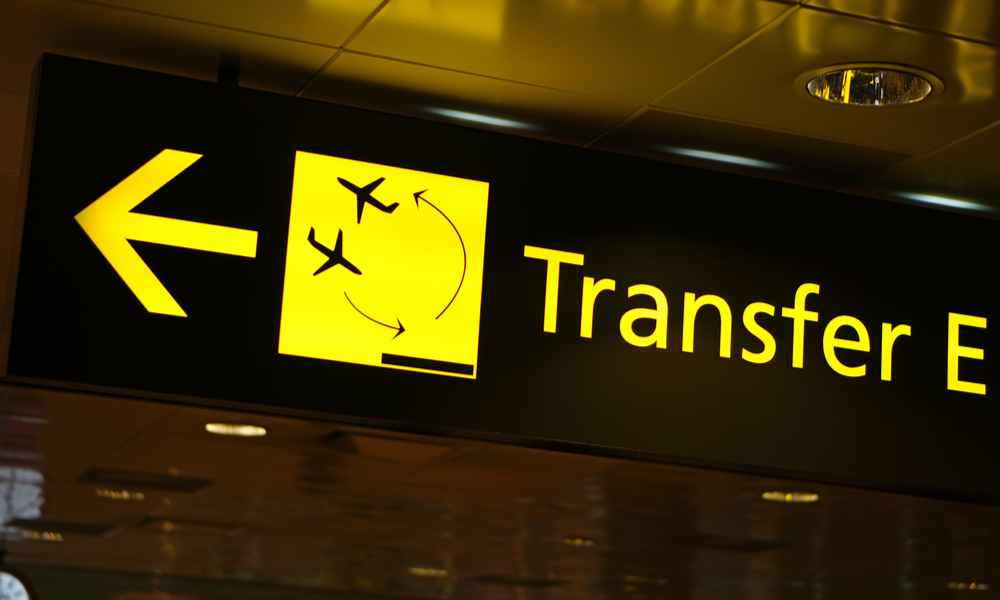  How to find cheap last minute flights: Flight Transfer sign in airport