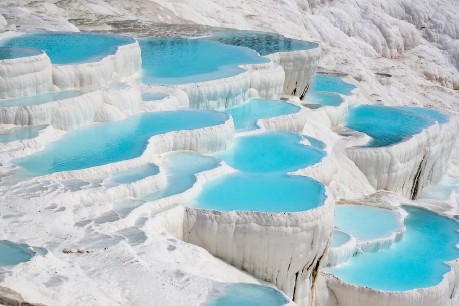 Natural travertine pools and terraces in Pamukkale. Cotton castle in southwestern Turkey