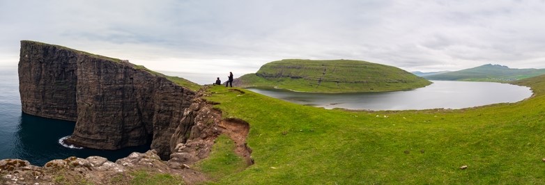 Amazing, panoramic view for Sorvagsvatn (Sørvágsvatn) lake above the ocean level and Traelanipa (Trælanípa) mountain peak, Vagar Island, Faroe Islands, Kingdom of Denmark.