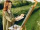 Woman painting outdoors